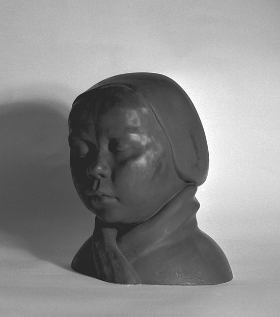 Ova Malmqvists skulpterade barnhuvud: