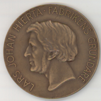 SLM 12512 1-2 - Medalj, Liljeholmens stearinfabrik hundra år 1939