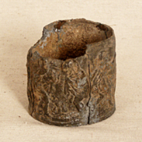 SLM 15352 - Bägare av bly, motiv i relief med de fyra årstiderna, fynd vid Jobstorp vid Nyköping