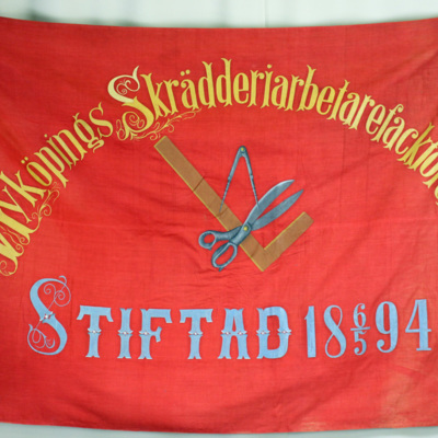SLM 9513 - Fana från 1894, Nyköpings skrädderiarbetare.