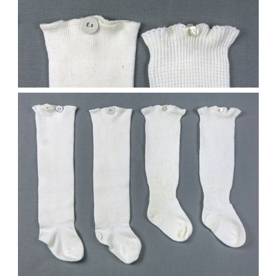 SLM 38974 1-2 - Två par strumpor för barn av vit bomull, från Ökna i Floda socken