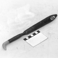 SLM 907 - Glättredskap av agat, använt vid bokbinderiarbeten