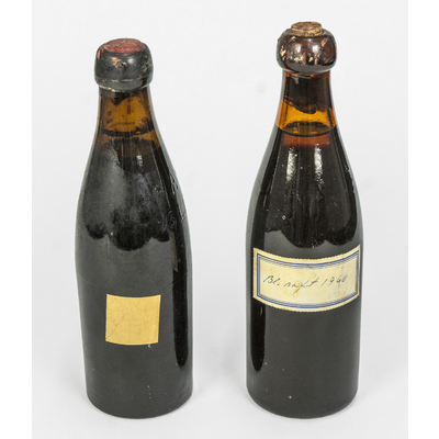 SLM 31715 1-2 - Två ölflaskor, återanvända till saft, en kokad 1953 och en ångkokad 1960