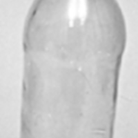 SLM 4586 - Apoteksflaska av gröntonat glas.