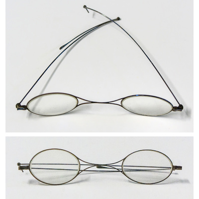 SLM 13960 - Stålbågade glasögon med ledade skalmar, ovalt glas, 1800-tal