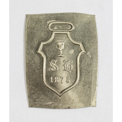 SLM 51360 - Stamp/kliché, bricka av nickel, sköld med kalk och text 