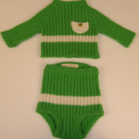 SLM 29256 1-2 - Babydress använd vid undervisning i barnavård, Gripenskolan, Nyköping