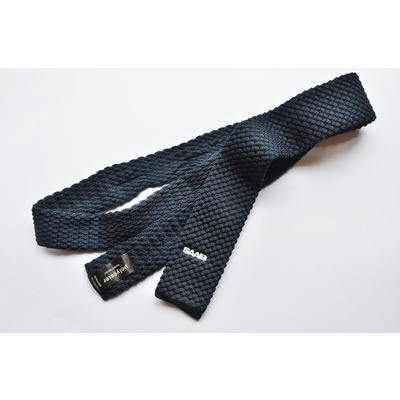 SLM 38042 - Stickad slips med texten 