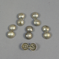 SLM 29072 10 - Manschettknappar av silver, tillhörande Flodadräkten