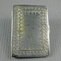 SLM 8794 - Miniatyrpärm med lås, av silver
