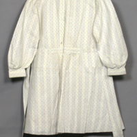 SLM 28607 - Kolt, förklädesklänning av bomull, från Ökna i Floda socken