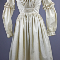 SLM 11894 - Flickklänning av tryckt bomullstyg, 1840-talet