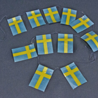 SLM 36977 - Julgranspynt, flaggspel med svenska flaggor