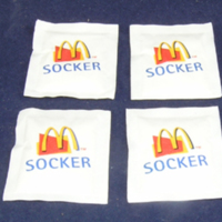 SLM 33758 1-4 - Förpackning, små påsar av papper avsedda för socker, McDonald's år 2005
