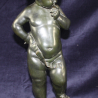 SLM 7144 - Figurin, amorin av svärtad brons, har tillhört konstnären Bernhard Österman